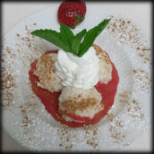 Arborio rice pudding with strawberry puree